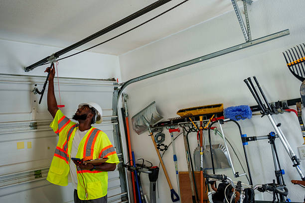 Professional Garage Door Roller Replacement technician working in North Liberty, IA